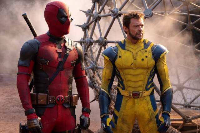Deadpool-and-Wolverine-stand-near-a-metal-cage-in-Deadpool-and-Wolverine.jpg